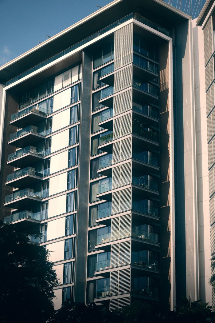 Contemporary high-rise apartment with modern design and clean lines in an urban setting.